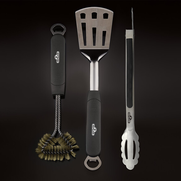 Pince, spatule et brosse pour Travel Q en inox sur fond noir - Napoleon