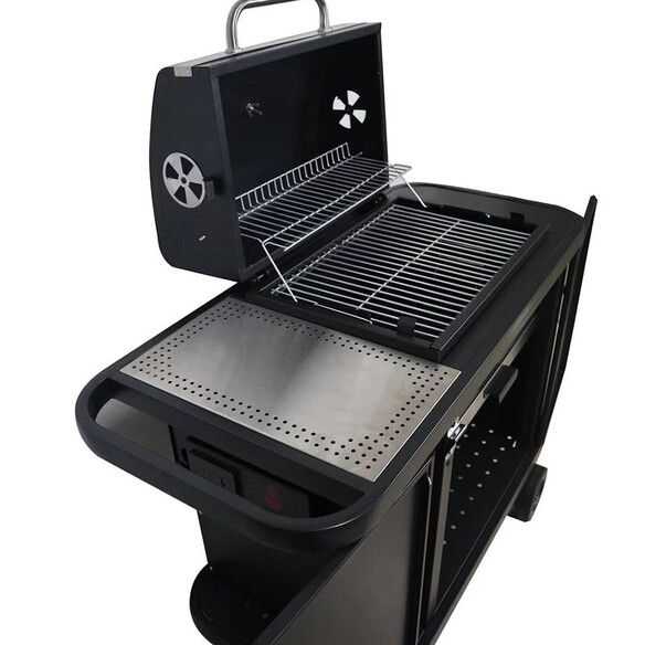Barbecue SNG One 2.0 Start'N'Grill de côté avec couvercle ouvert, grille inox et tablette latérale inox