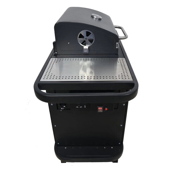 Barbecue SNG One 2.0 Start'N'Grill de côté avec couvercle fermé, ventilation ouverte et tablette latérale en inox