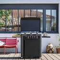 Cuisson sur la plancha Fusion 75 installé sur son chariot en acier gris cargo et noir - ENO