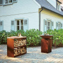 Meuble dressoir range-bois Ofyr acier corten sur terrasse