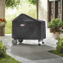 Housse barbecue charbon Performer Deluxe et Premium Weber en action