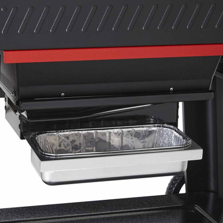 Vue sur le récupérateur de graisses du barbecue pellets Searwood 600 de Weber Vue sur le récupérateur de graisses du barbecue pellets Searwood 600 de Weber