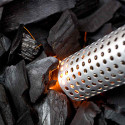 Charbon en train de s'embraser au contact de l'allume-feu Looftlighter Original Charbon en train de s'embraser au contact de l'allume-feu Looftlighter Original