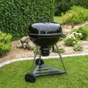 barbecue charbon Smok 60 Cook'in Garden dans un jardin