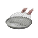 Nettoyage d'une grille de cuisson dans le bac inox Grillfürst