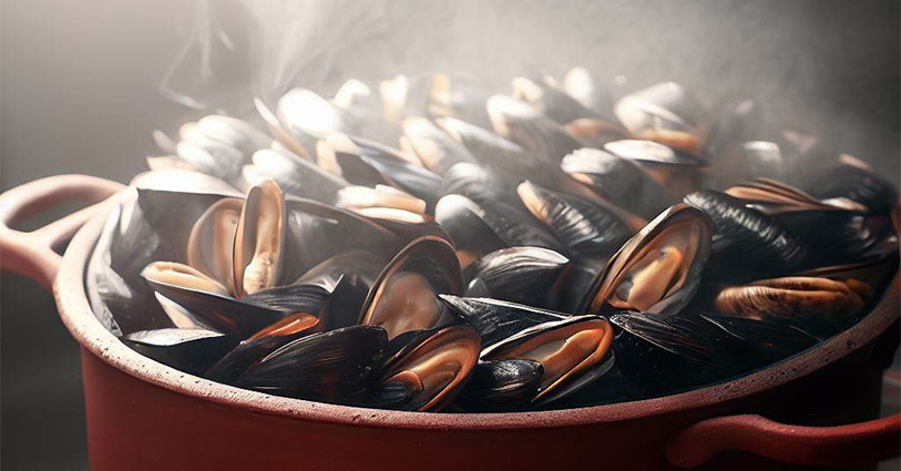 Moules grillées au barbecue et beurre d’ail persillé