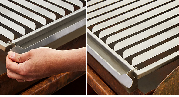 Zoom sur la grille en inox avec barres creuses en V sur le barbecue Gueuleton