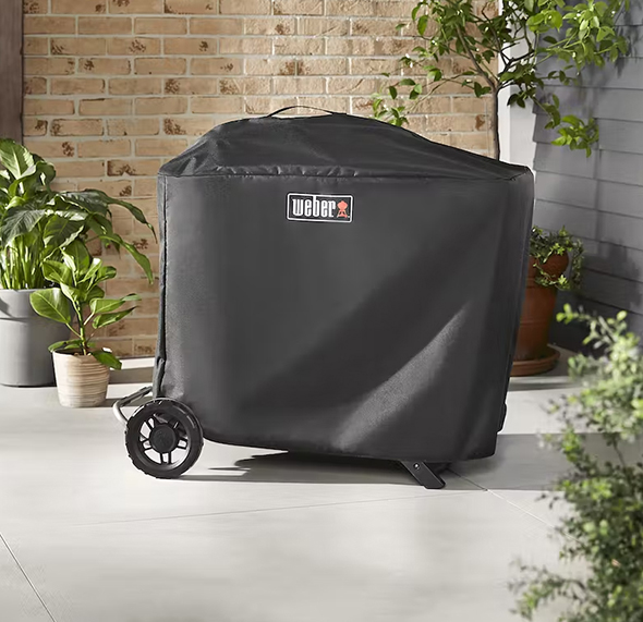 barbecue Weber Traveler dans se housse Premium